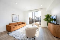 Modern 1BR Apt | Roof Deck, EV Charger, & Parking