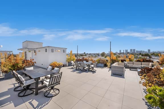Luxury 3BR Suite Near BH | Roofdeck, Gym + EV Spot