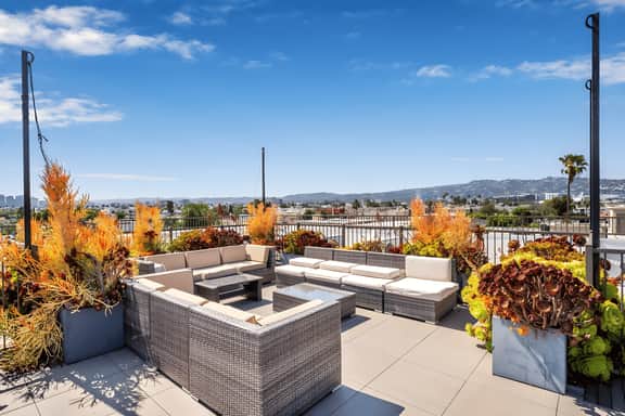 Luxury 3BR Suite Near BH | Roofdeck, Gym + EV Spot